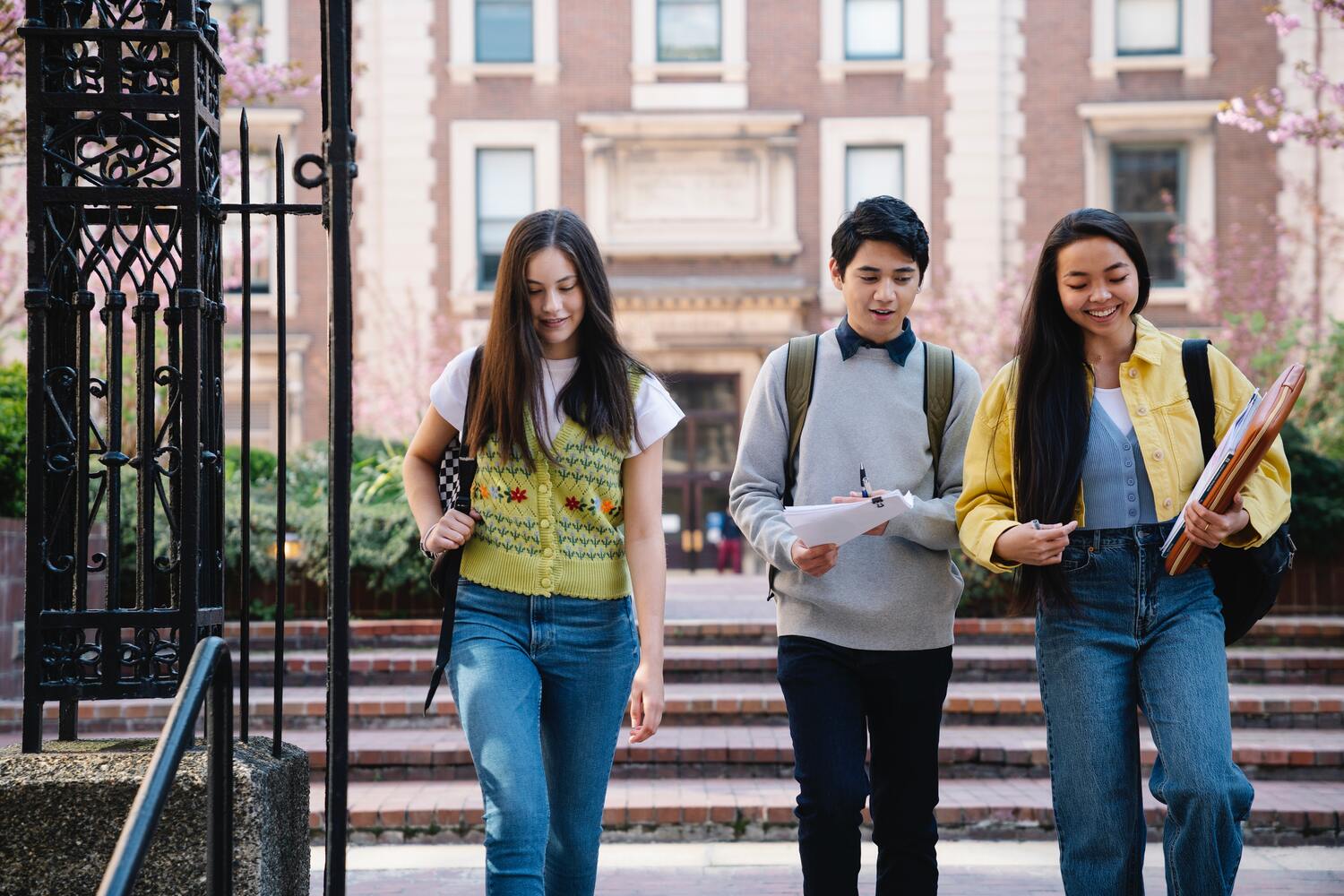 Students walking in front of an university building