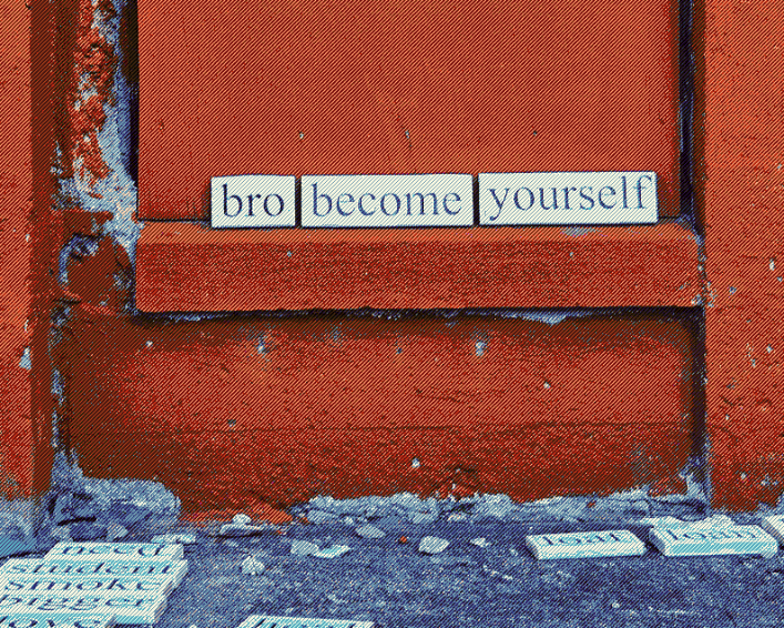 Three wooden planks, decorated to look like poetry magnets, rest against a red wall. They read "bro become yourself"
